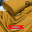 Roll of camel-colored fabric with 'Guchha Gee Fabrics' branding.